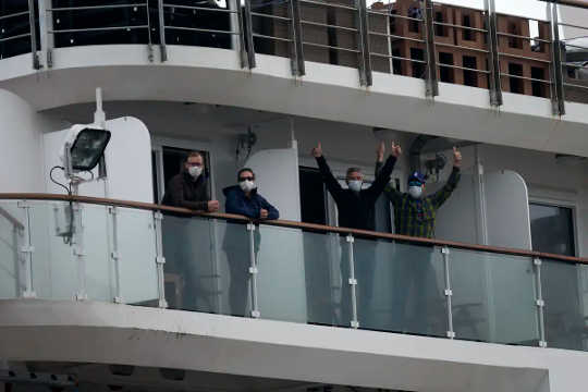 Every passenger aboard the Greg Mortimer, a cruise ship bound for Antarctica, was given a surgical face mask. 