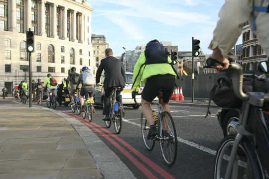 Commuters cycling to work.