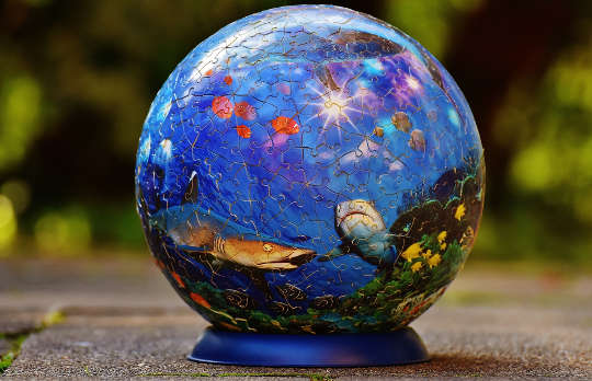 a puzzle ball with the ocean and sea creatures