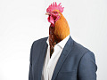 a man in a suit but with a rooster instead of a head and face