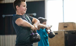 Children and teens engaged in strength training.