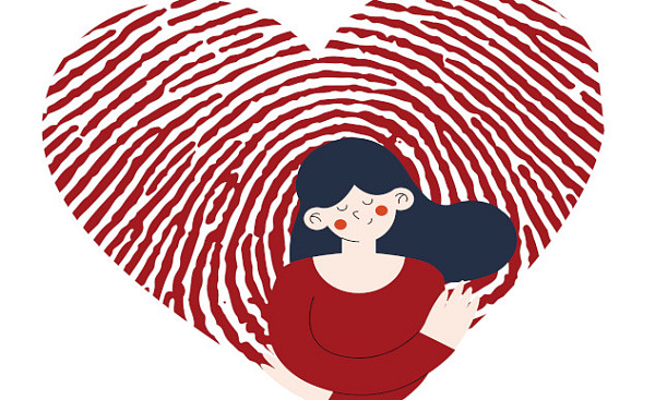 an image of a woman in front of a huge "fingerprint" heart