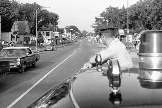 A Minneapolis police officer in a predominantly black area during unrest in 1967.