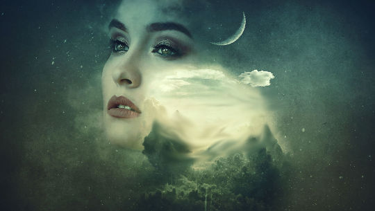 woman's face with a young new moon in the background