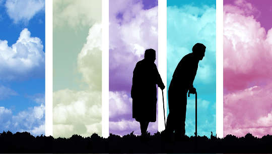 an older couple walking with canes