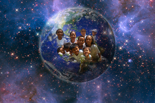 a group of people inside a globe of planet earth