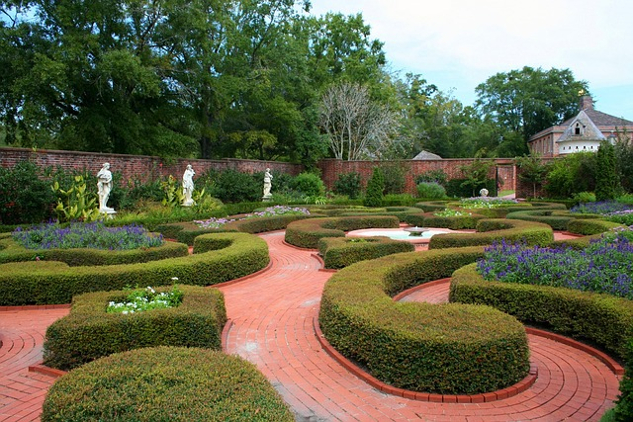 a formal garden known as a knot garden with numerous paths