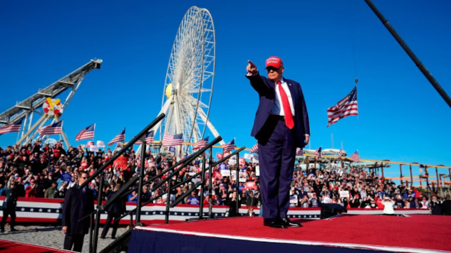 An image of Trump addressing crowds, symbolizing the rise of authoritarianism fueled by bigotry and racism.