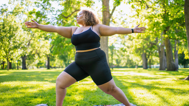 A runner on an outdoor path illustrating the connection between genetics and weight loss through exercise.