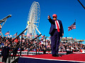 An image of Trump addressing crowds, symbolizing the rise of authoritarianism fueled by bigotry and racism.