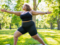 A runner on an outdoor path illustrating the connection between genetics and weight loss through exercise.