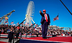 An image of Trump addressing crowds, symbolizing the rise of authoritarianism fueled by bigotry and racism.