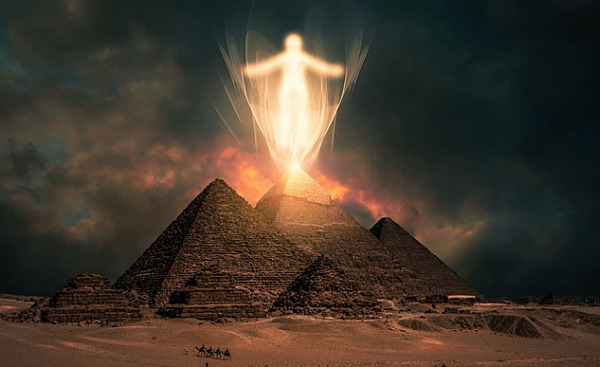 a ghostly figure above the pyramids