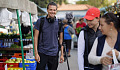 people in a farmer's market