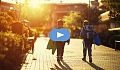 two young boys walking down the street by themselves