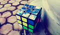 rubik's cube with artistic drawings on the top